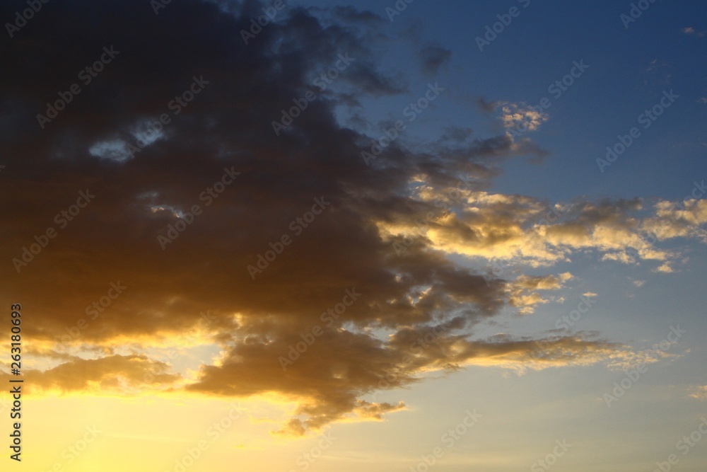 amazing bright sunset or sunrise clouds in the sky for using in design as background.
