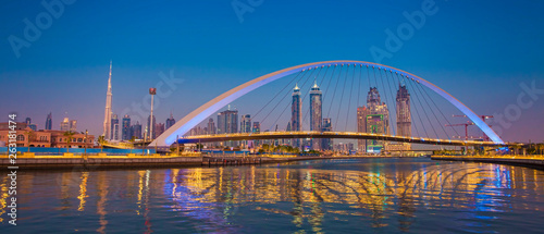 Dubai city skyline at night. view of Tolerance bridge