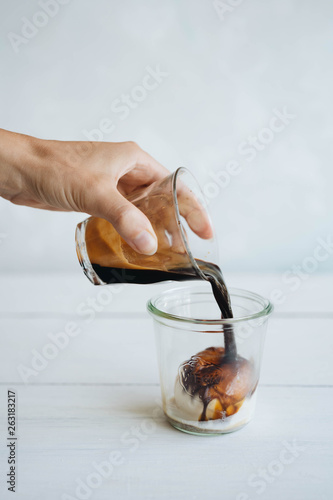 Coffee affogato with vanilla ice cream and espresso photo