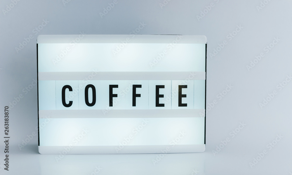 Photo of a light box with text, COFFEE, isolated background Photo of a light box with text, COFFEE, isolated background