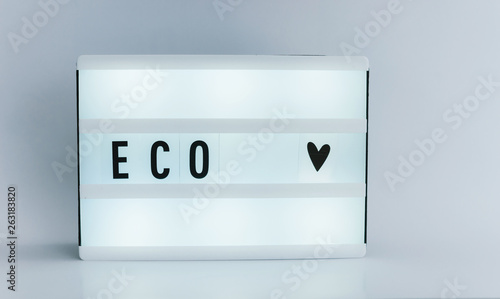 Photo of a light box with text, ECO, white isolated backround photo