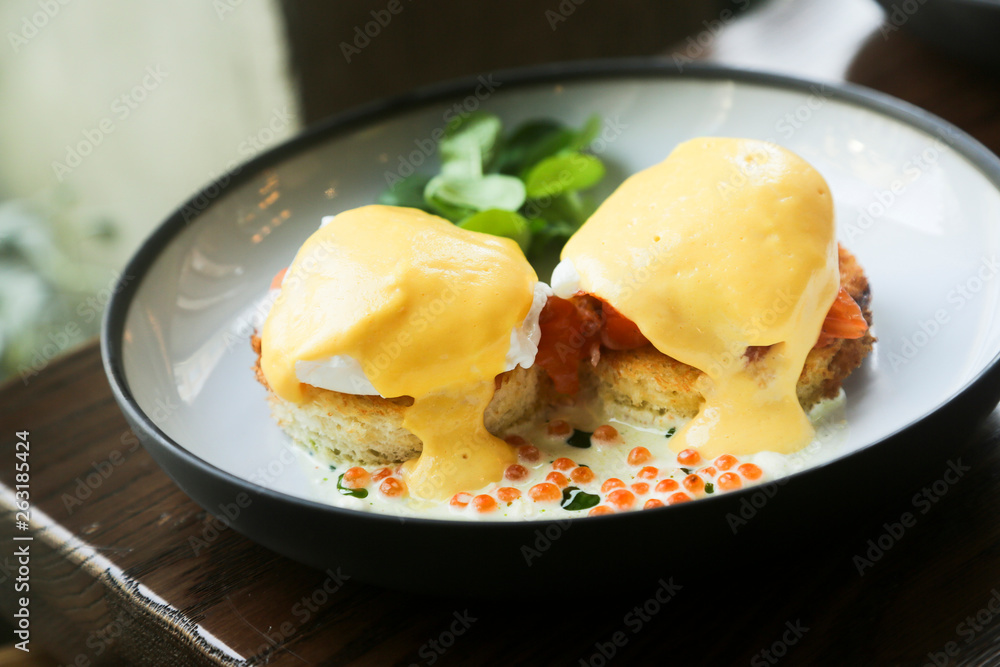 Eggs Benedict with smoked salmon and caviar