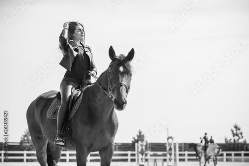 Woman in a rancho with a horse. Hobby time   © T.Den_Team