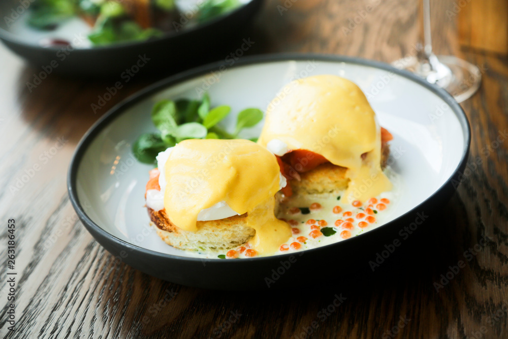 Eggs Benedict with smoked salmon and caviar