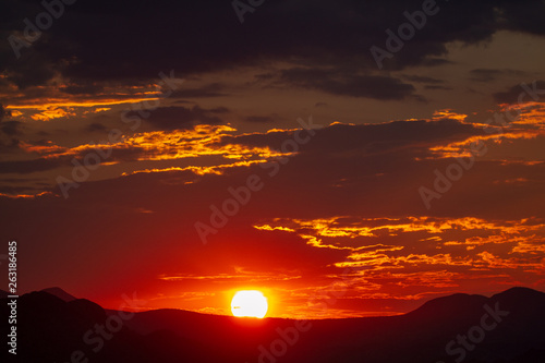 sunset at the ethosa national park of namibia between desert and savannah photo