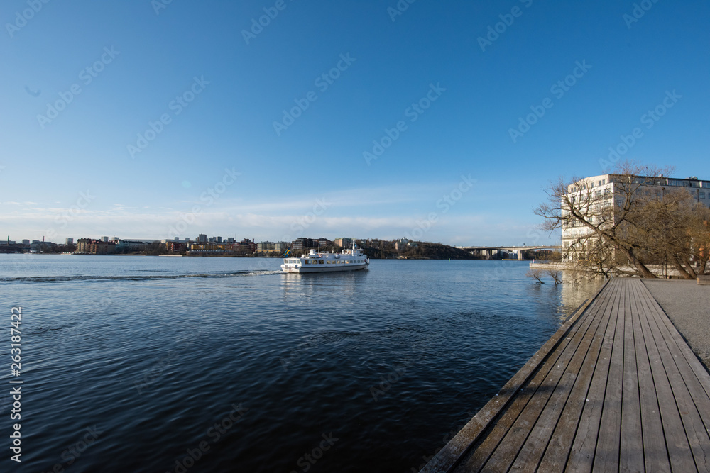 Water view with commuting boat from The Essingen island in Stockholm,