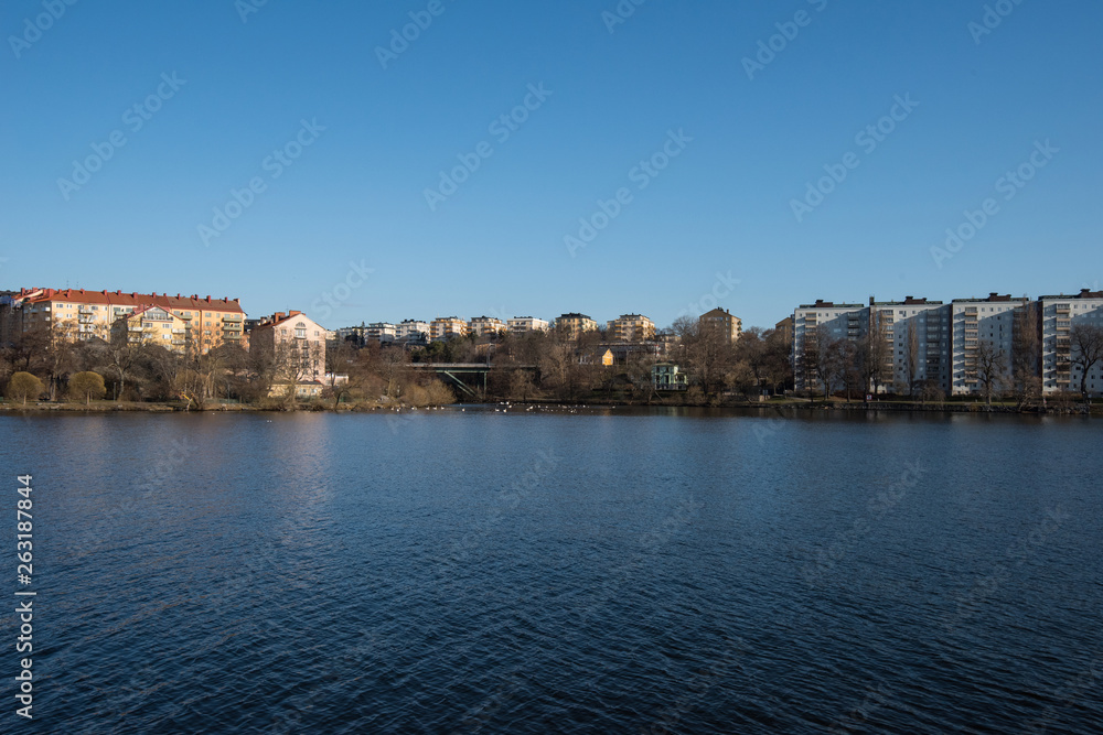 Water view over the Essigen and Kungsholmen islands in Stockholm a sunny spring day
