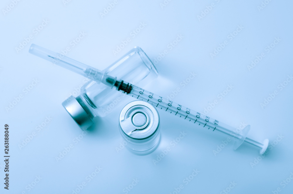 Vaccines, botulinum toxin and insulin ampules concept theme with glass