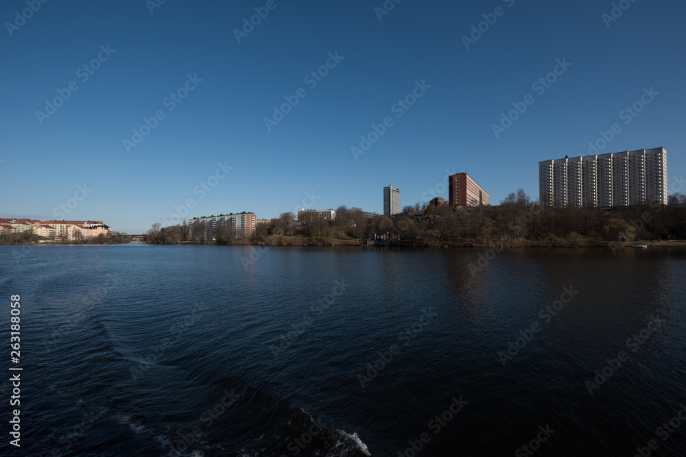 Water view over the Essigen and Kungsholmen islands in Stockholm a sunny spring day