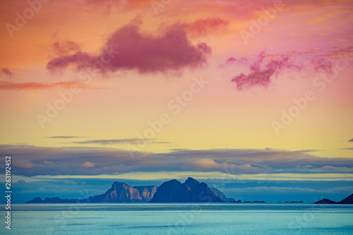 Island on the horizon. Beautiful sea landscape in evening. Wild nature Norway, seascape.