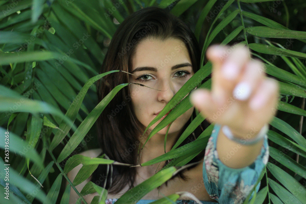 Sexy young brunette beauty in a rain forest Sexy young brunette beauty in a rain forest