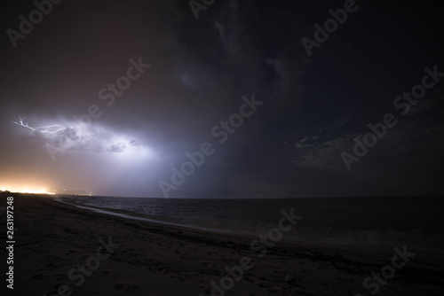 summer storm with lightning at the beach