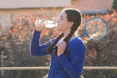 а girl and badminton