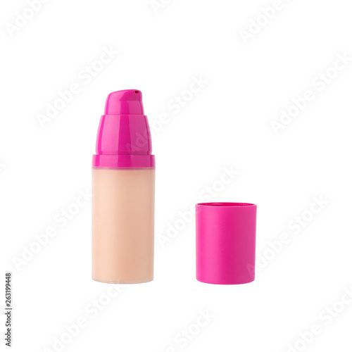 Face foundation beige cream in glass bottle with open plastic pink cap on white background isolated close up, eye concealer dispenser package mockup, makeup skin corrector or toned base jar template