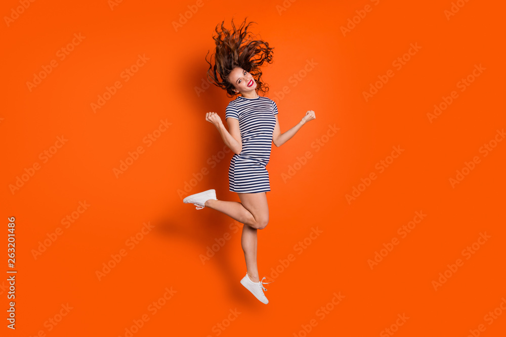 Full length body size photo portrait of pretty ecstatic glad optimistic nice charming gorgeous with blowing hairdo she her student lady raising fists hands up isolated vivid background Full length body size photo portrait of pretty ecstatic glad optimistic nice charming gorgeous with blowing hairdo she her student lady raising fists hands up isolated vivid background