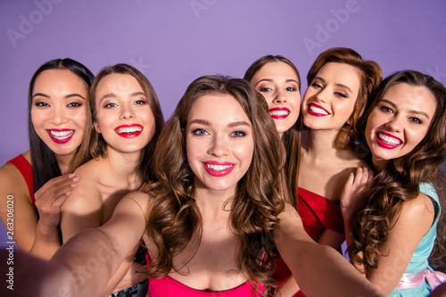 Self-portrait of nice-looking sweet magnificent lovely lovable winsome feminine fascinating charming attractive cheerful ladies buddy fellow isolated over purple violet background