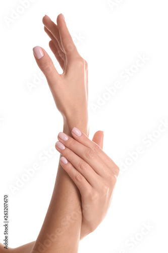 Woman with beautiful hands on white background  closeup. Spa treatment
