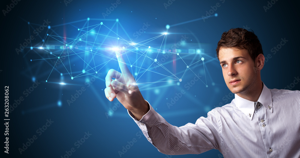 Man touching hologram screen displaying modern web system
Man touching hologram screen displaying modern web system