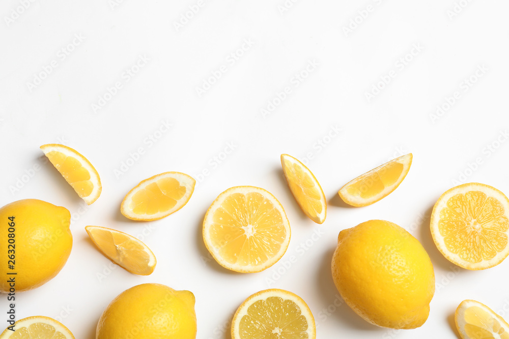 Fresh lemons on white background, top view. Citrus fruits