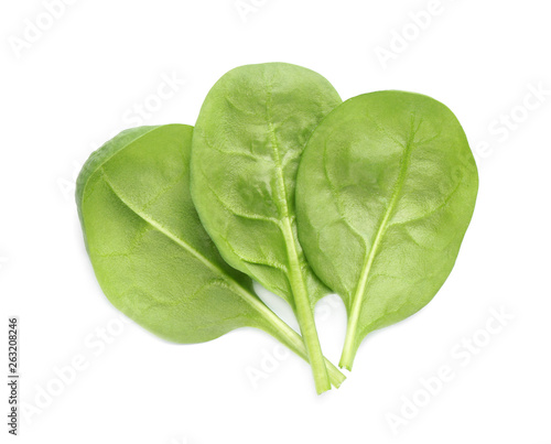 Fresh leaves of spinach isolated on white, top view