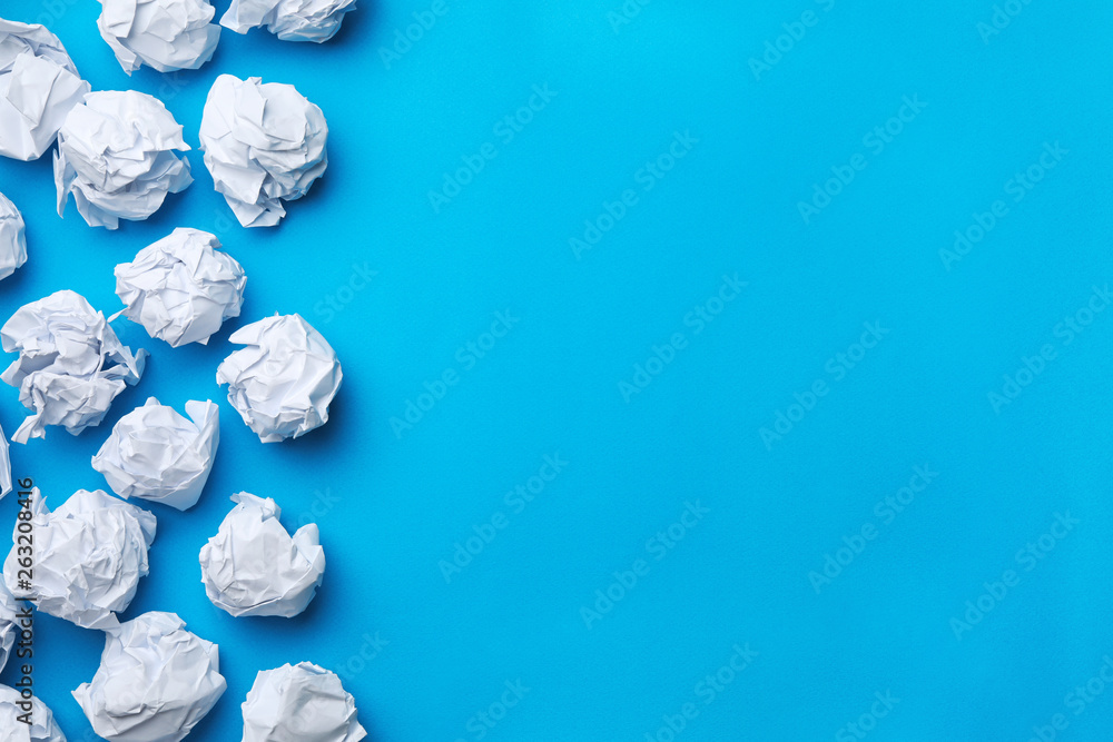 Paper balls on color background, flat lay. Space for text Paper balls on color background, flat lay. Space for text