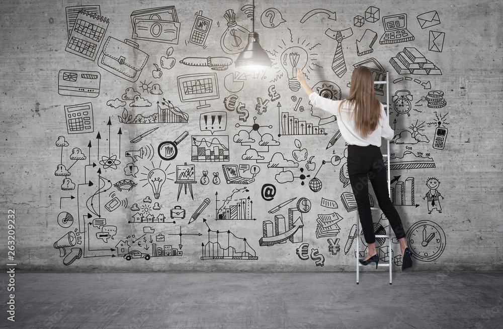 Young woman standing on a ladder and drawing a business plan sketch on a concrete wall. 3d render elements in collage Young woman standing on a ladder and drawing a business plan sketch on a concrete wall. 3d render elements in collage