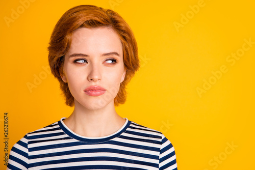 Close-up portrait of her she nice-looking lovely charming attractive suspicious girl looking aside future planning isolated over bright vivid shine yellow background