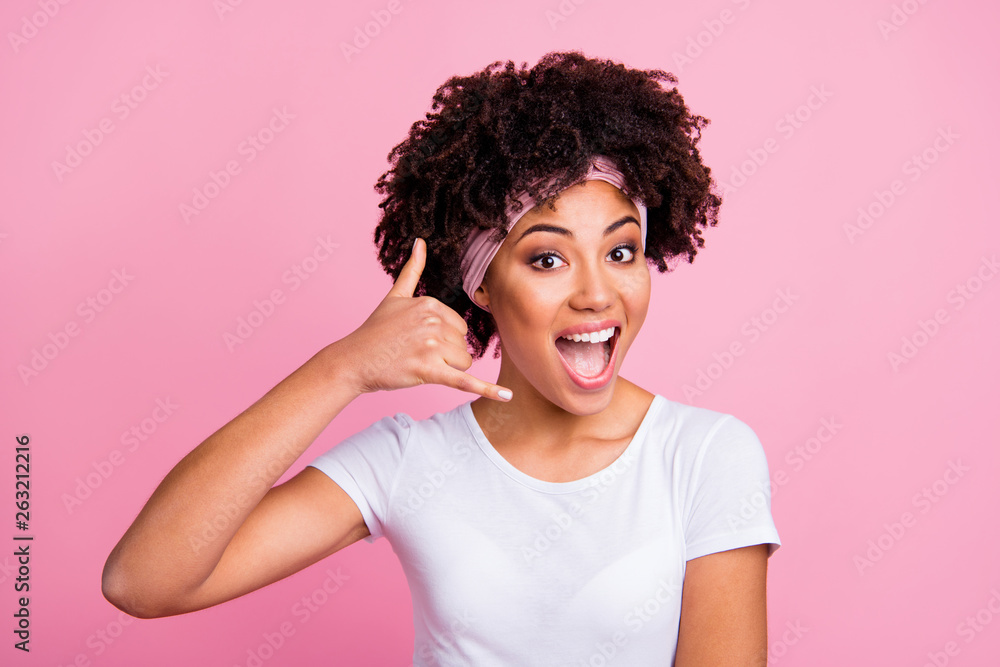 Close up photo beautiful amazing her dark skin brunette model lady arm hand near ear communication talk conversation wear head scarf casual white t-shirt isolated pink bright background Close up photo beautiful amazing her dark skin brunette model lady arm hand near ear communication talk conversation wear head scarf casual white t-shirt isolated pink bright background