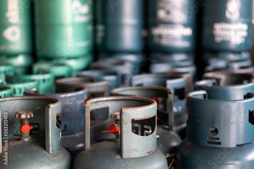 Fotografie Stack of old  cooking gas cylinder in gas store.