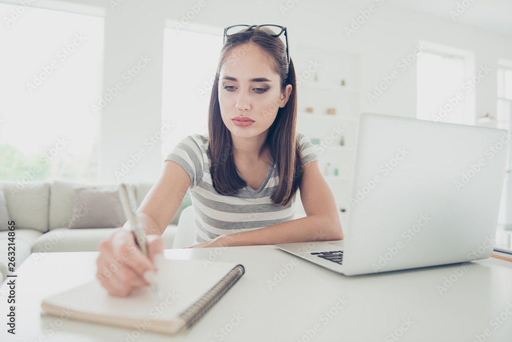 Obraz premium Close up photo beautiful attentive she her lady hands arms pen pencil write notes planner after homey web lesson wear jeans denim striped t-shirt sit comfort chair house bright living room indoors