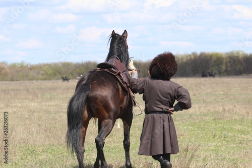 Race horses and riders on them.
