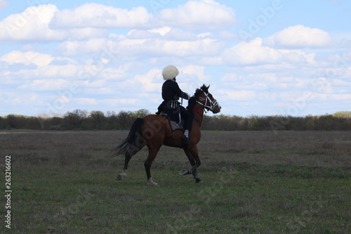 Race horses and riders on them.