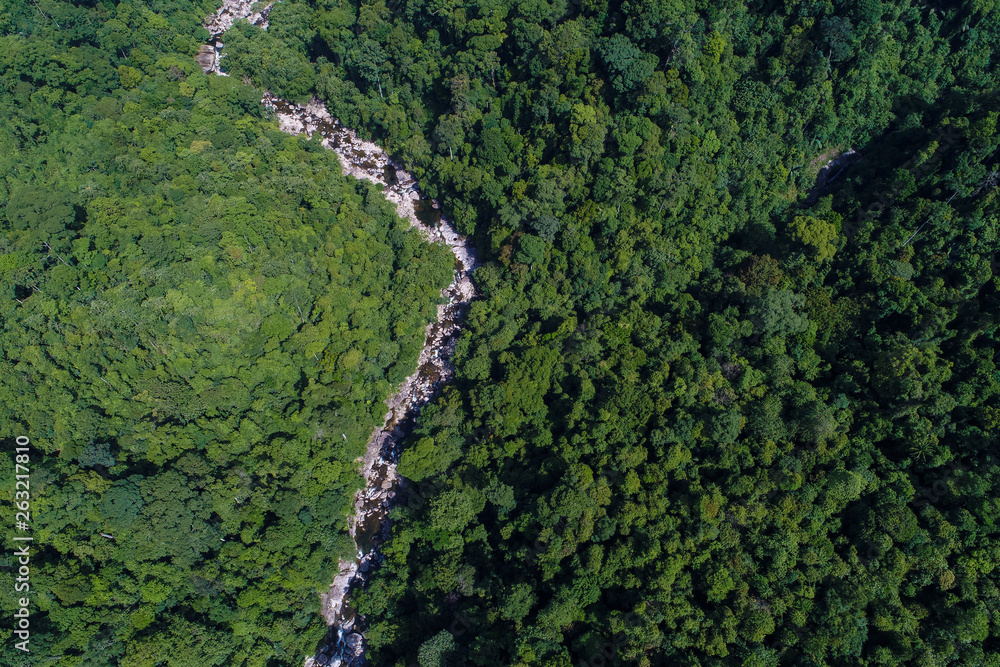 Aerial view waterfall in tropical deep forest green tree Aerial view waterfall in tropical deep forest green tree