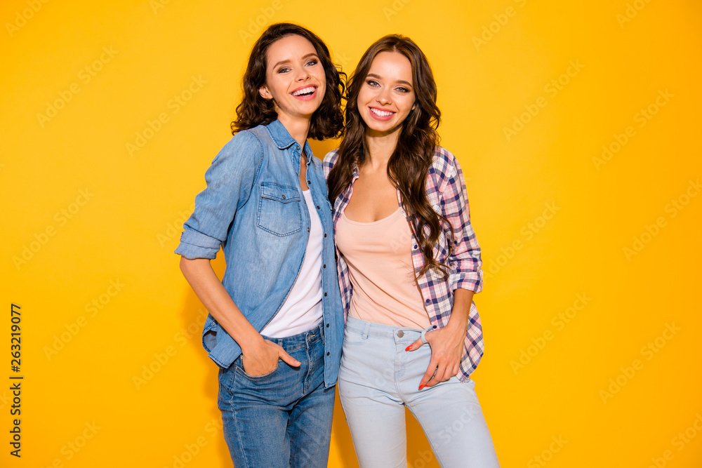 Portrait of charming beautiful ladies have free time holidays long hair place hands palms pockets dressed modern checkered summer outfit denim isolated on colorful vivid background Portrait of charming beautiful ladies have free time holidays long hair place hands palms pockets dressed modern checkered summer outfit denim isolated on colorful vivid background