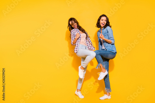 Full length body size view photo funny funky carefree careless summer travel beautiful raise fist scream satisfied content shout yes aim goal luck lucky checked denim outfit isolated bright background