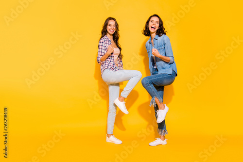 Full length body size view photo charming funny funky fellows fellowship feel glad content travel summer raise fists celebrate luck lucky wear checkered clothing isolated on colorful background
