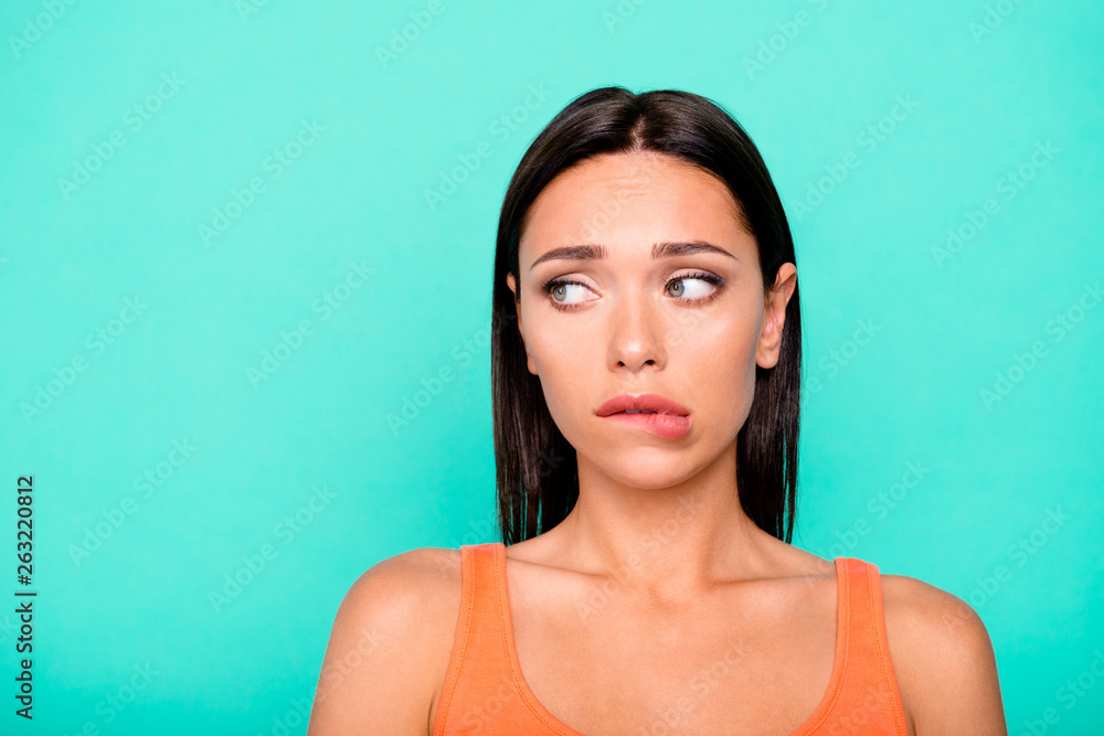 Closeup photo portrait of sad upset stressed tired exhausted cute she her lady biting lips looking aside wearing casual t-shirt isolated pastel background Closeup photo portrait of sad upset stressed tired exhausted cute she her lady biting lips looking aside wearing casual t-shirt isolated pastel background