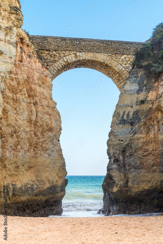 Bizarre rock formations and cliffs on the Pinhao beach at the southern Algarve near Lagos, Portugal