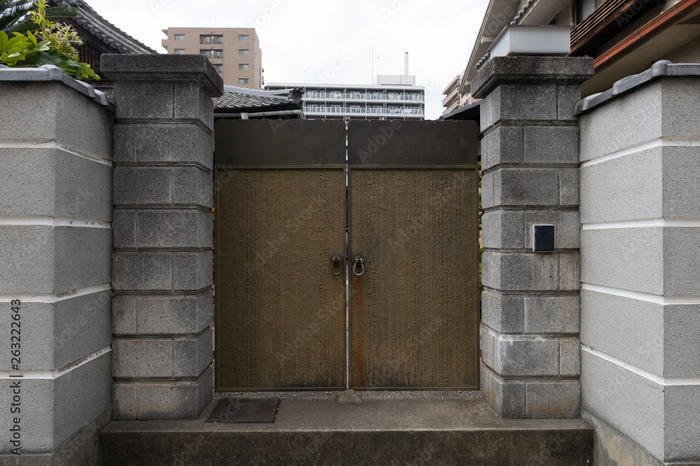 Fototapeta premium sidewalk by street wall & door
