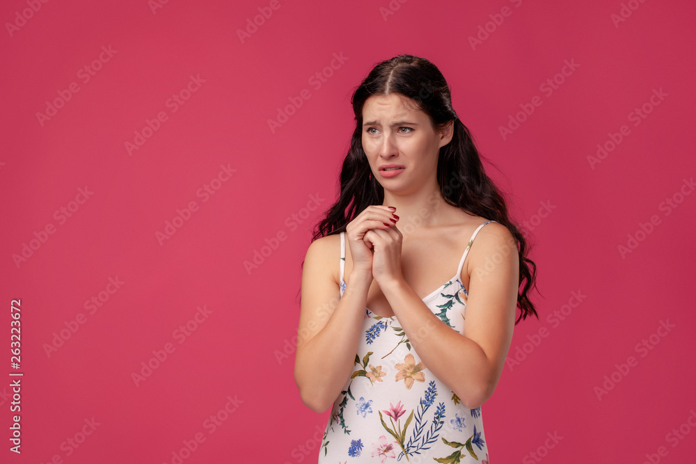 A close up image of a beautiful woman praying with her hands foldedand A close up image of a beautiful woman praying with her hands foldedand
