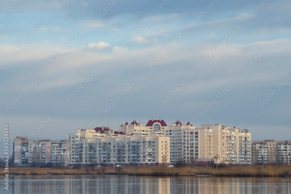 High-rise buildings on the river bank. Panoramic view.