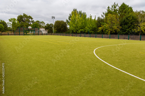 Amateur Soccer Field Under a Blue Cloudy Sky