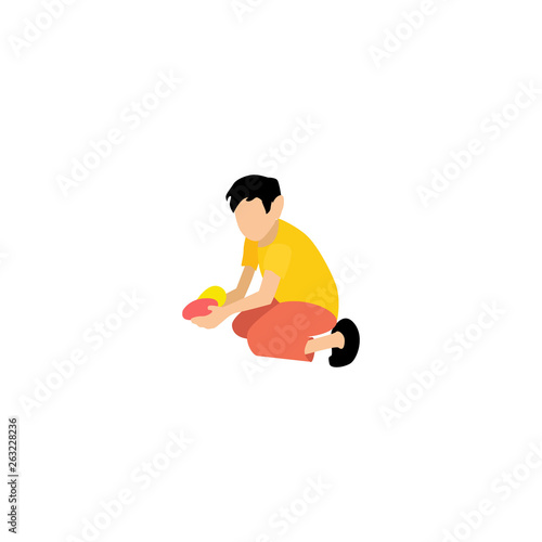 boy with black hair sits on the ground and holds Easter eggs