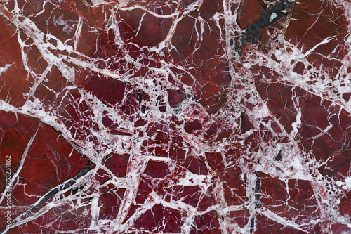 The finishing stone. The polished red marble. Texture.