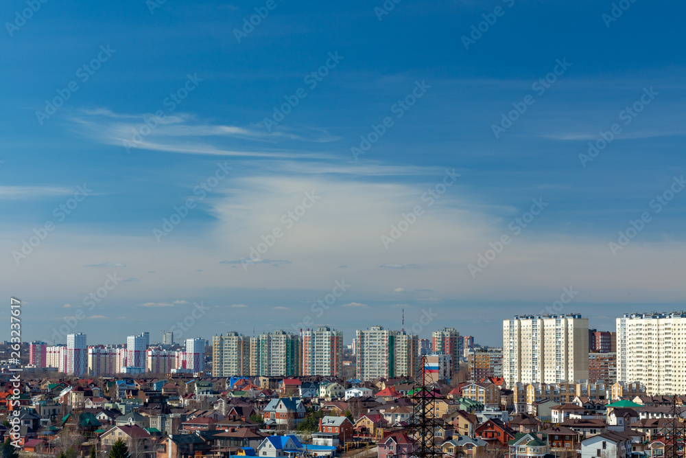 Naklejka premium panorama of the spring city and the sky