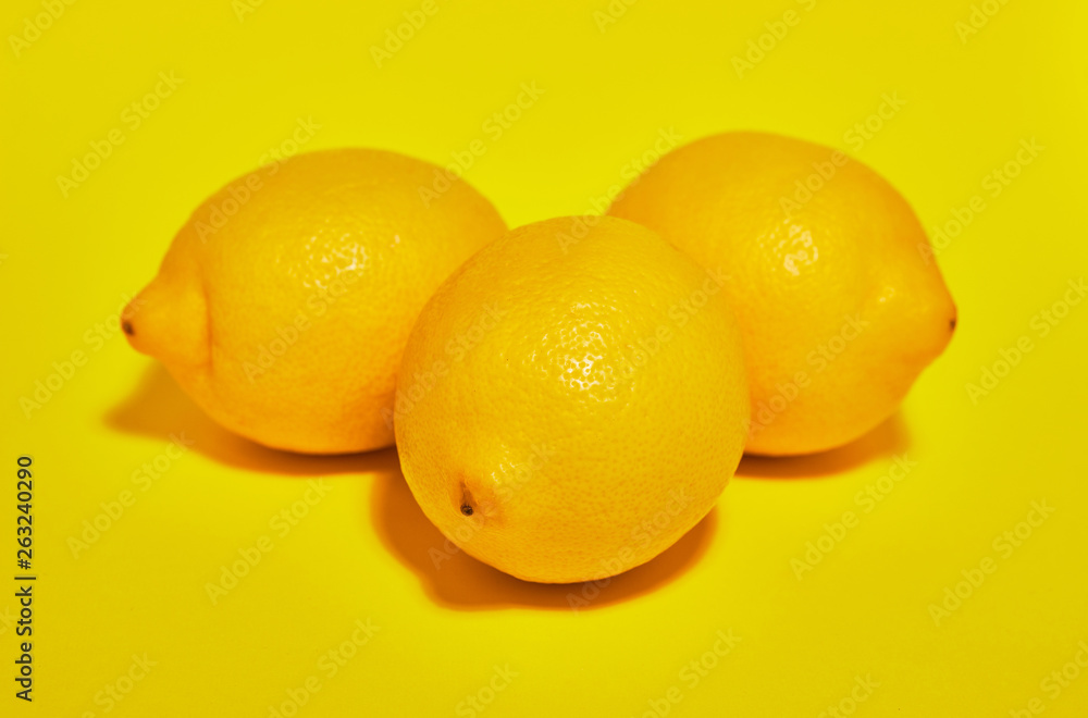 Lemon on yellow background. Сopy space . Food concept. Lemon on yellow background. Сopy space . Food concept.