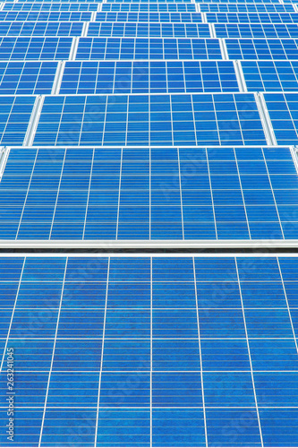 Symmetrical blue field with many  solar panels