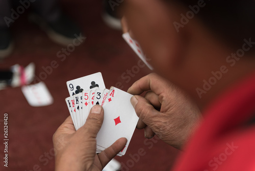 Man playing cards on the street