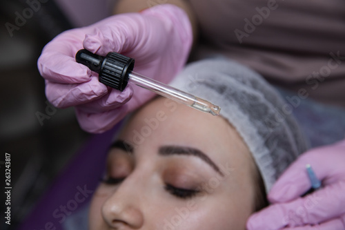 Process of applying hyaluronic acid in cosmetology cabinet