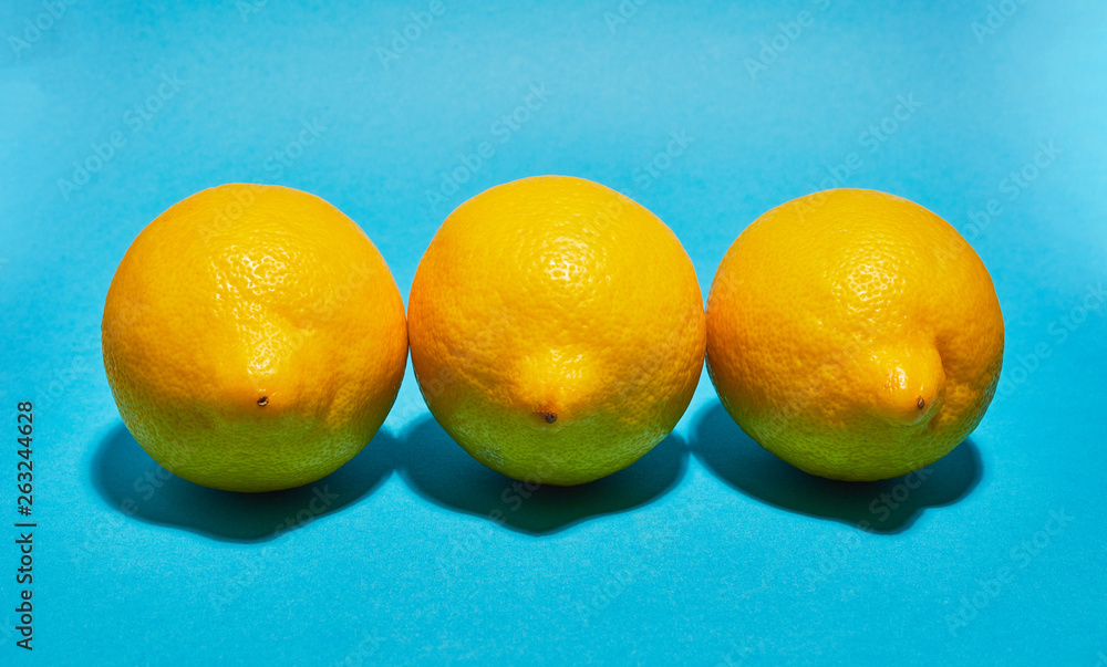 Lemon on blue background. Сopy space . Food concept. Lemon on blue background. Сopy space . Food concept.